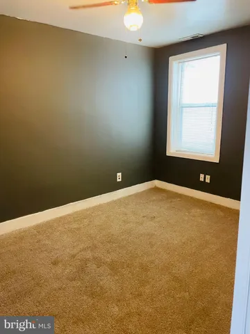 an empty room and window