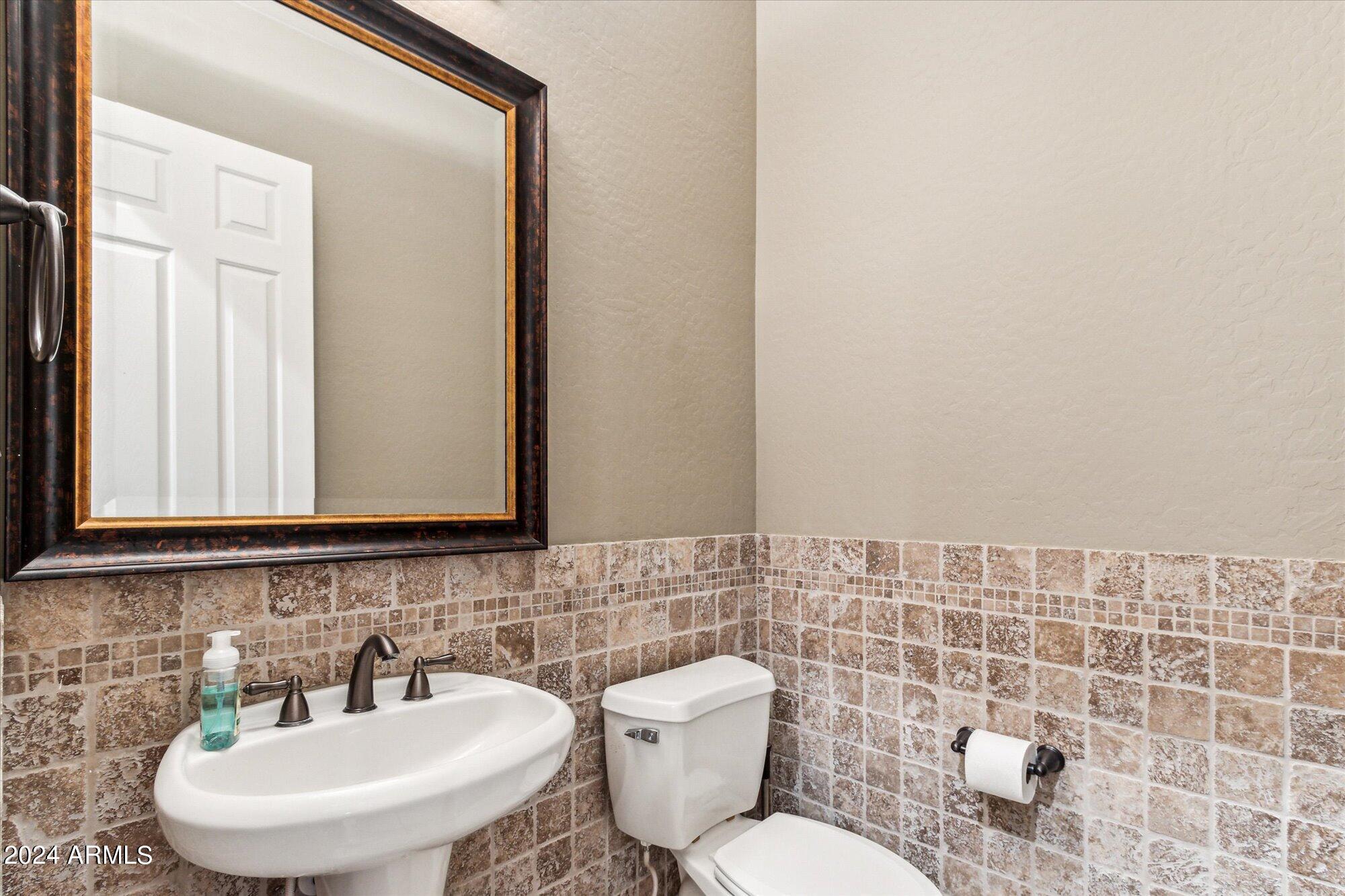 18095 West Narramore Road Goodyear, AZ 85338 - Photo 31 of 48 Half bathroom
