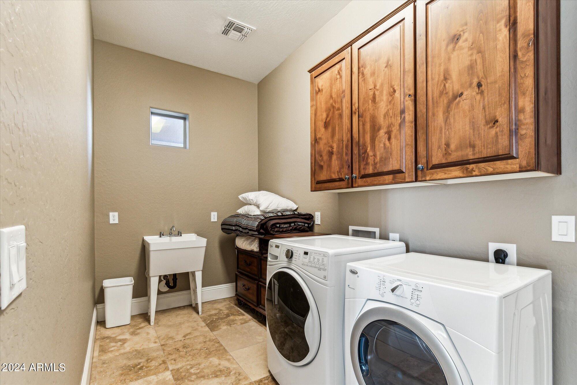18095 West Narramore Road Goodyear, AZ 85338 - Photo 32 of 48 Laundry room