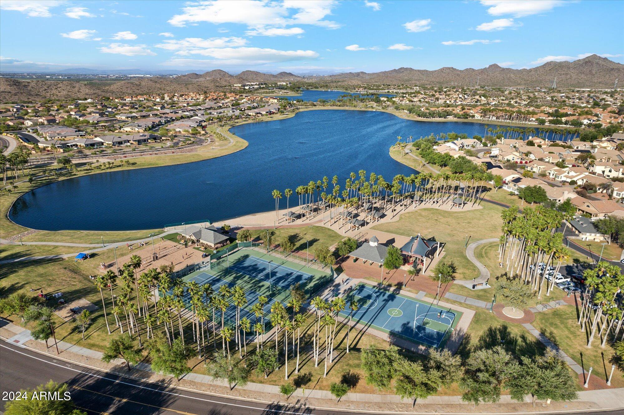 18095 West Narramore Road Goodyear, AZ 85338 - Photo 45 of 48 South lake with pickleball courts