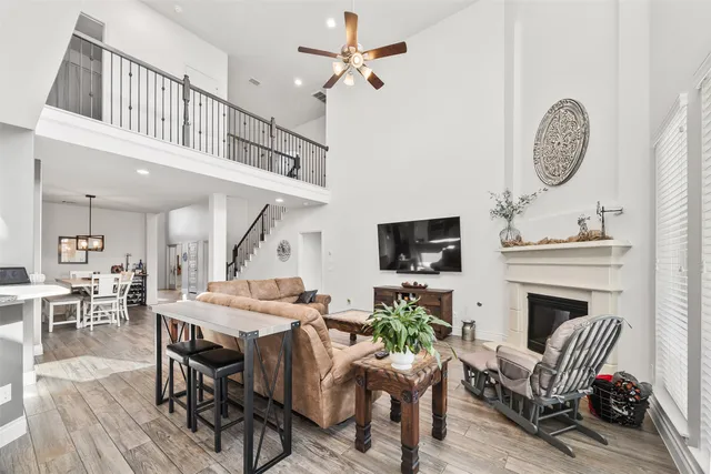 a view of a livingroom with furniture and a kitchen