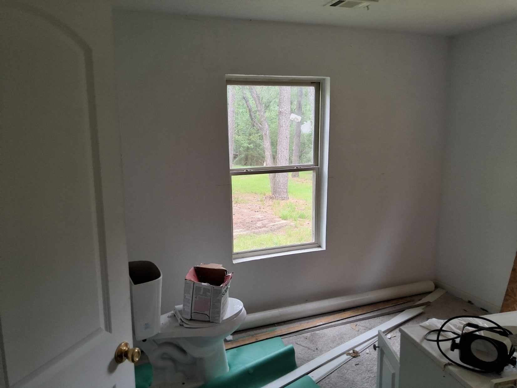 933 Shore Shadow Houston, TX 77336 - Photo 4 of 17 a room with a window