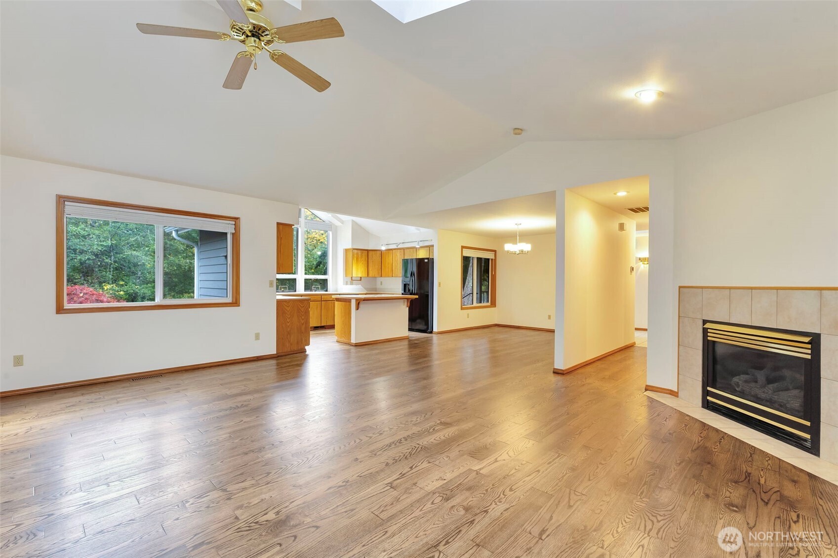 3830 Mari Lane Southeast Olympia, WA 98513 - Photo 22 of 32 a view of an empty room with a window and fireplace