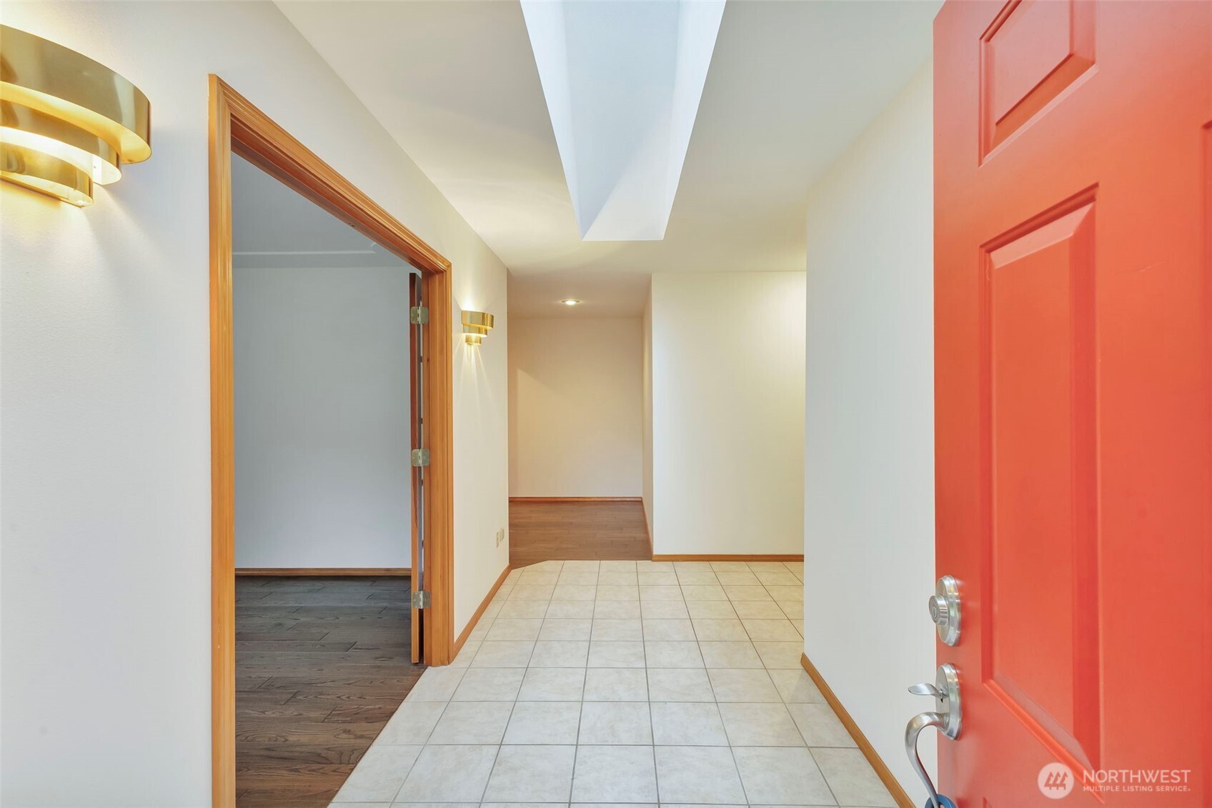 3830 Mari Lane Southeast Olympia, WA 98513 - Photo 4 of 32 a view of a hallway with wooden floor