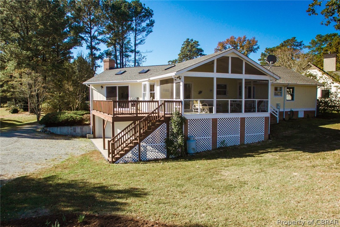 293 Prentice Point Drive Kilmarnock, VA 22482 - Photo 40 of 41 Screened Porch with Under Deck Storage