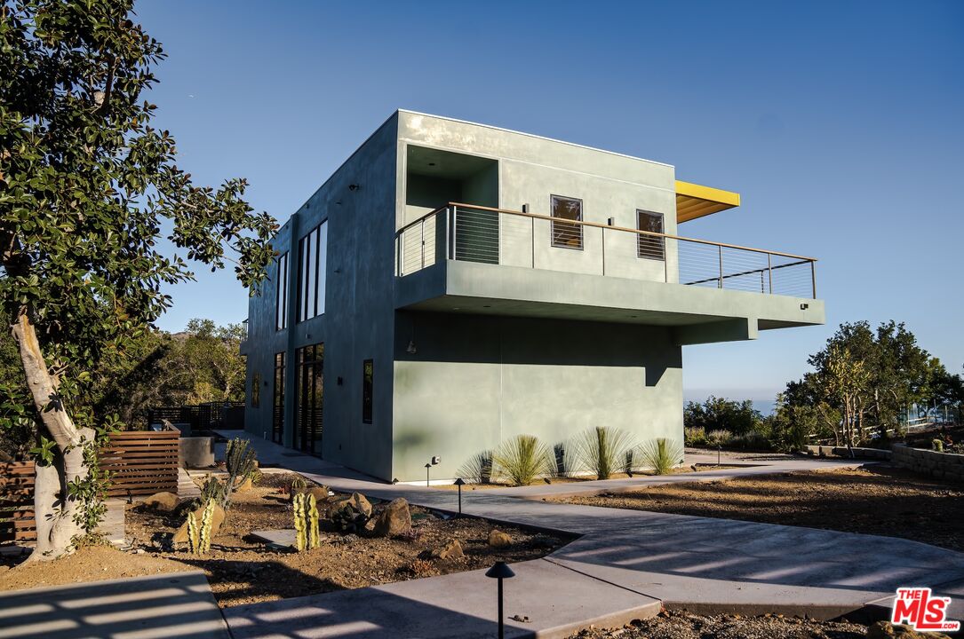 a building outdoor space with patio furniture