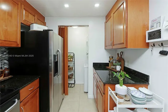 $454,000 | 215 Southwest 42nd Avenue, Unit PH08, Miami, FL 33134