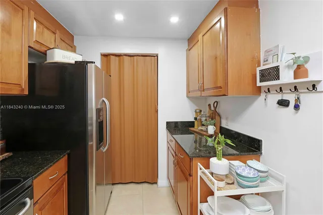 $454,000 | 215 Southwest 42nd Avenue, Unit PH08, Miami, FL 33134