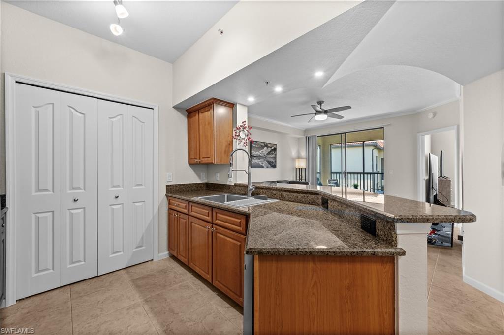 12970 Positano Circle, Unit 302 Naples, FL 34105 - Photo 9 of 22 Kitchen Bar