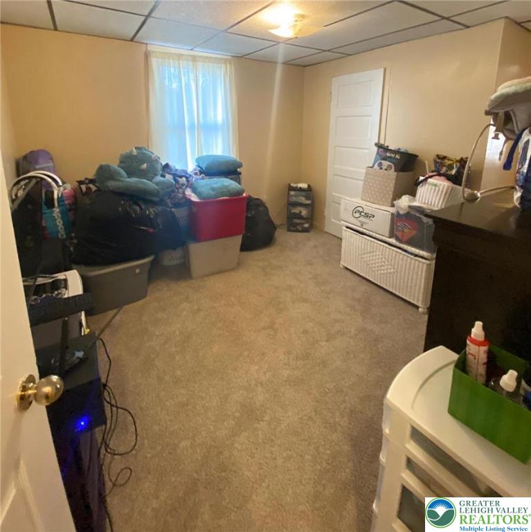 339 East Howe Street Allentown, PA 18109 - Photo 13 of 20 a bedroom with a bed and a dresser