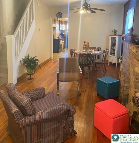 a view of kitchen and refrigerator