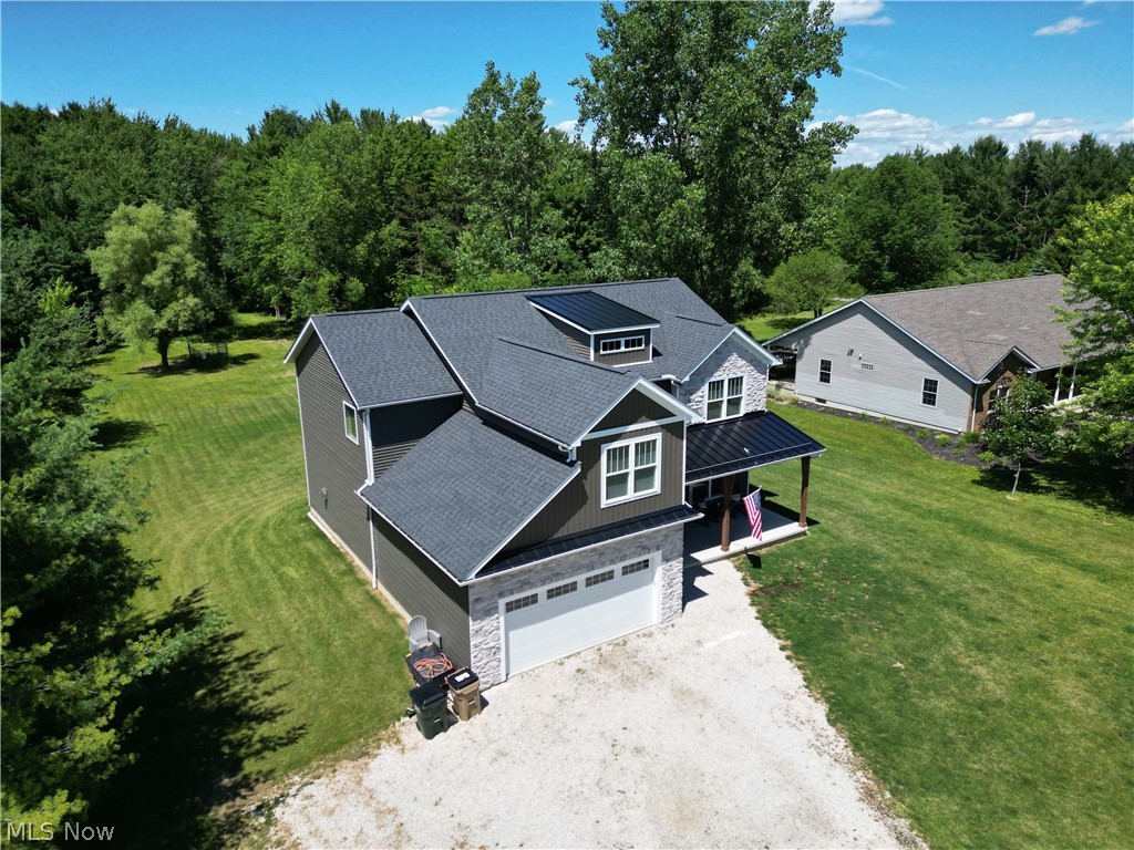 4553 Sharon Copley Road Medina, OH 44256 - Photo 25 of 32 Contemporary two-story residence featuring dark gray siding and stone facade accents