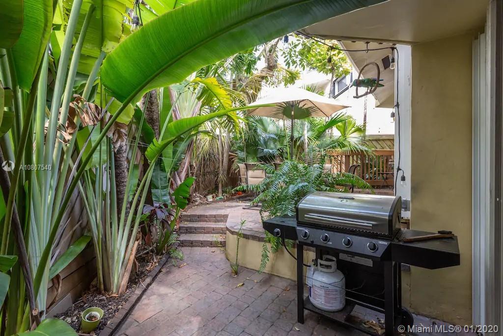 2575 Tigertail Avenue, Unit 2575 Miami, FL 33133 - Photo 11 of 13 wraparound patio