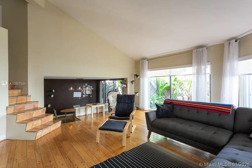 2575 Tigertail Avenue, Unit 2575 Miami, FL 33133 - Photo 3 of 13 Living room open to dining