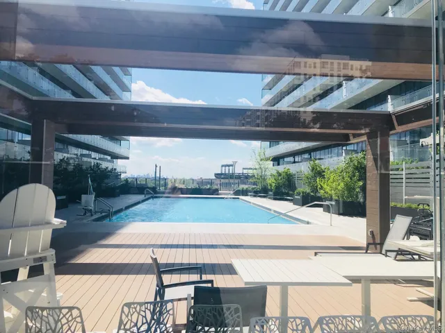 a view of swimming pool with outdoor seating
