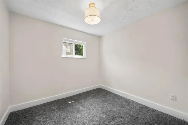 a view of balcony with wooden floor
