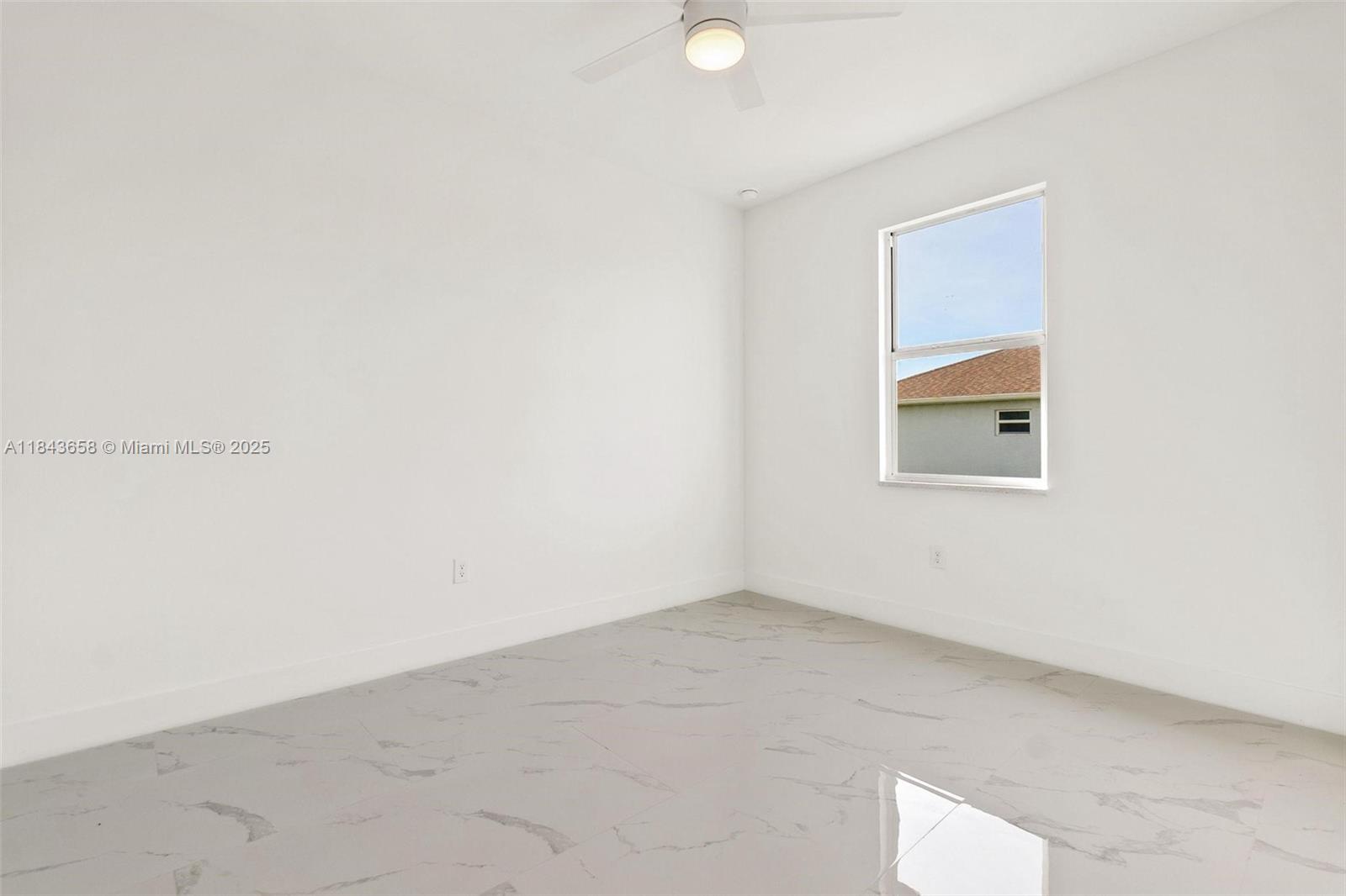 2516 Park Road, Unit 2516 Lehigh Acres, FL 33971 - Photo 11 of 13 a view of an empty room
