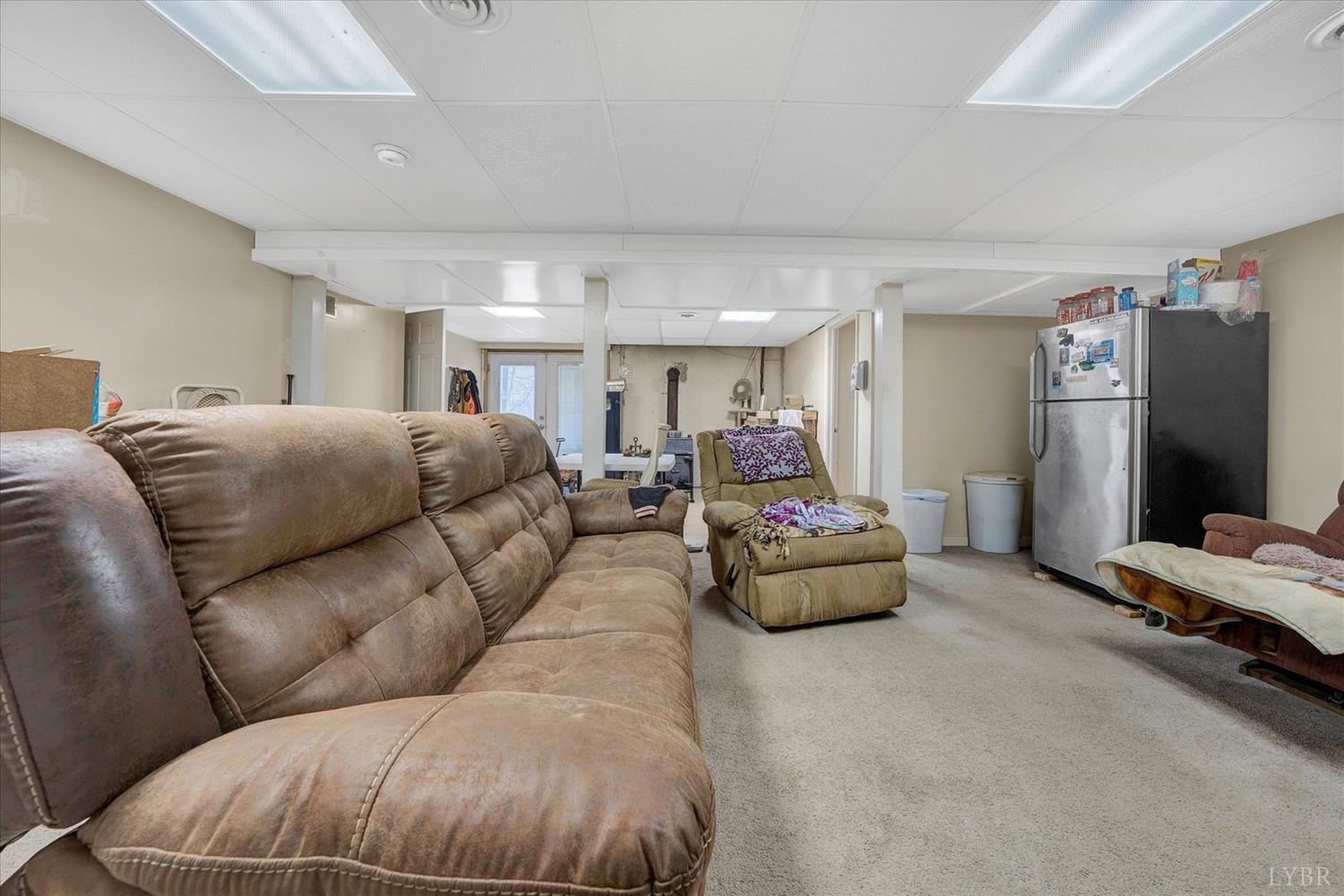 1408 Woodridge Road Blue Ridge, VA 24064 - Photo 23 of 39 a living room with furniture and a couch