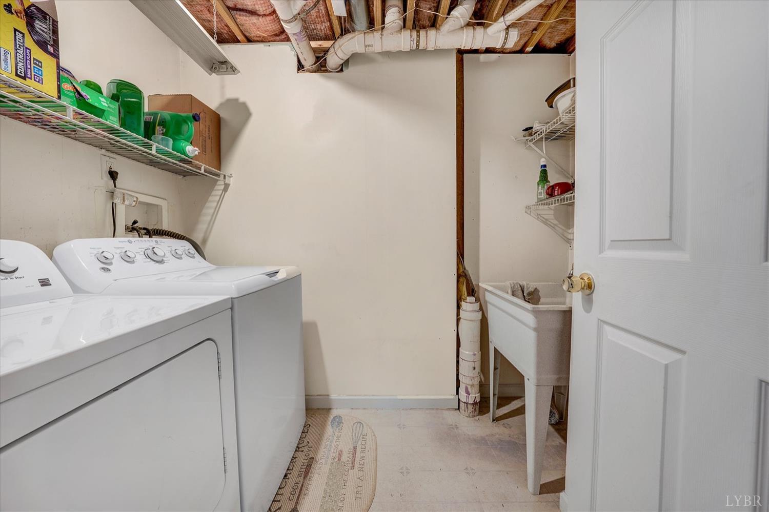 1408 Woodridge Road Blue Ridge, VA 24064 - Photo 25 of 39 a utility room with dryer and washer