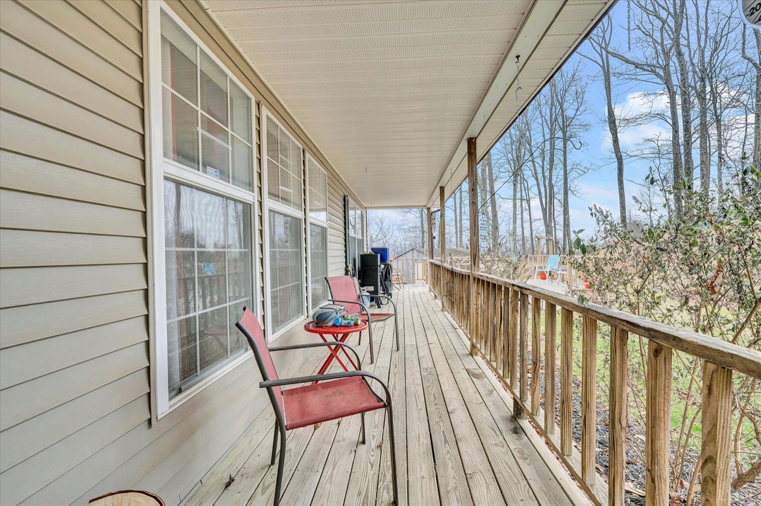 1408 Woodridge Road Blue Ridge, VA 24064 - Photo 3 of 39 a view of a balcony with furniture