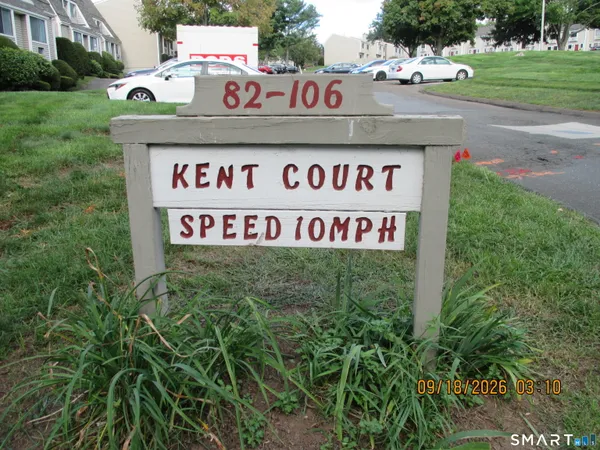 a sign broad on the side of a road