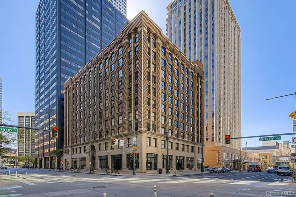a view of a building with a street