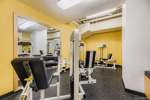 a view of a workspace with furniture and a livingroom