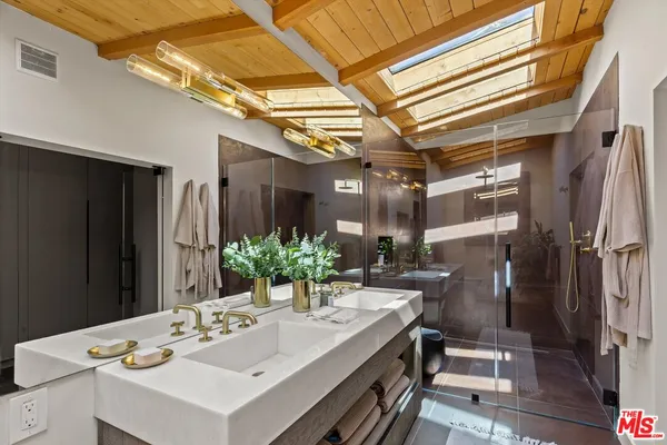a view of a swimming pool with furniture