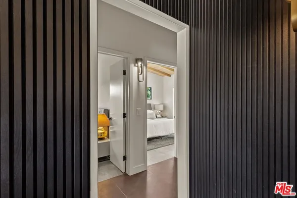 view of door with wooden door