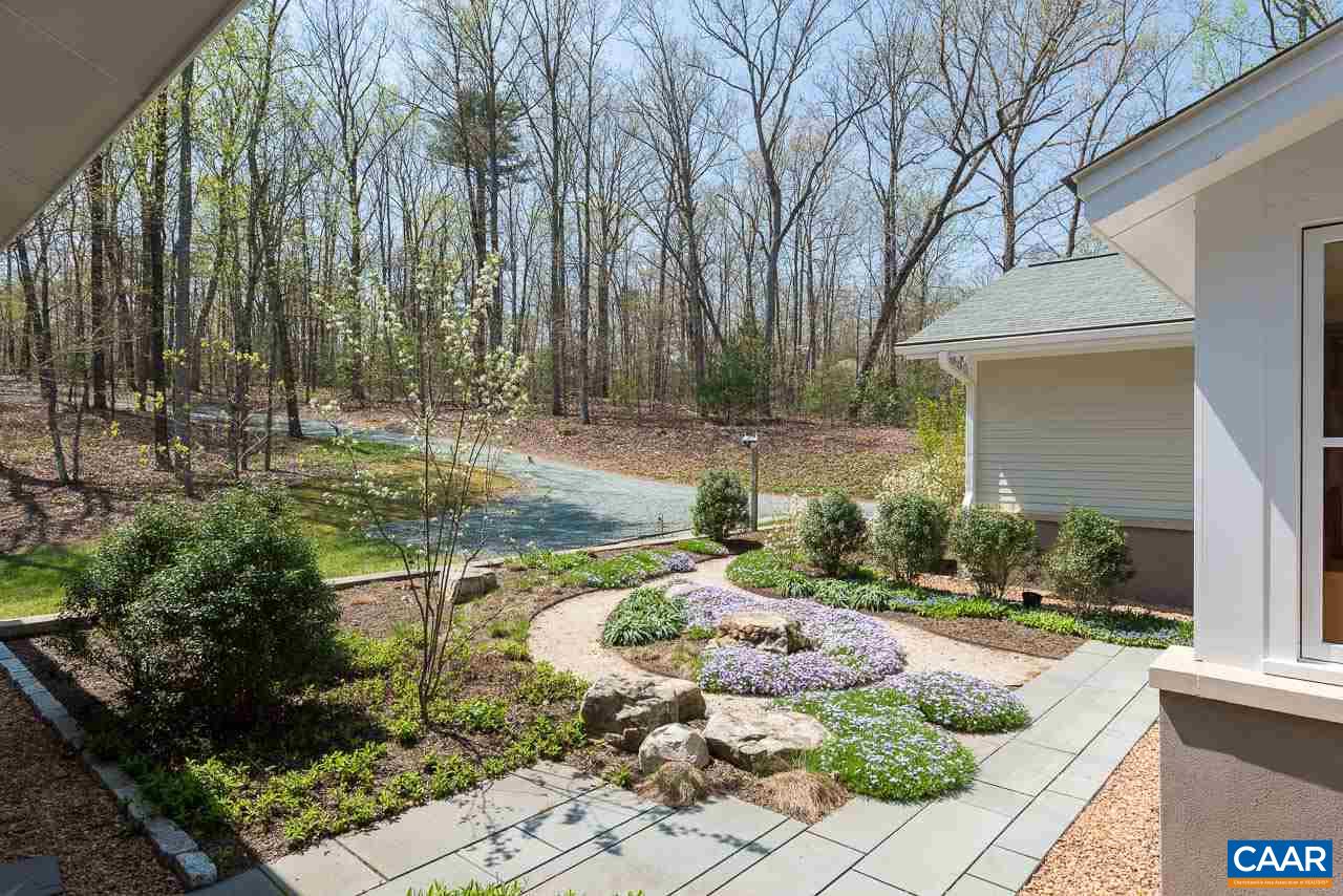 80 Ruritan Ridge Lane Scottsville, VA 24590 - Photo 8 of 37 Lovely courtyard garden with water feature.