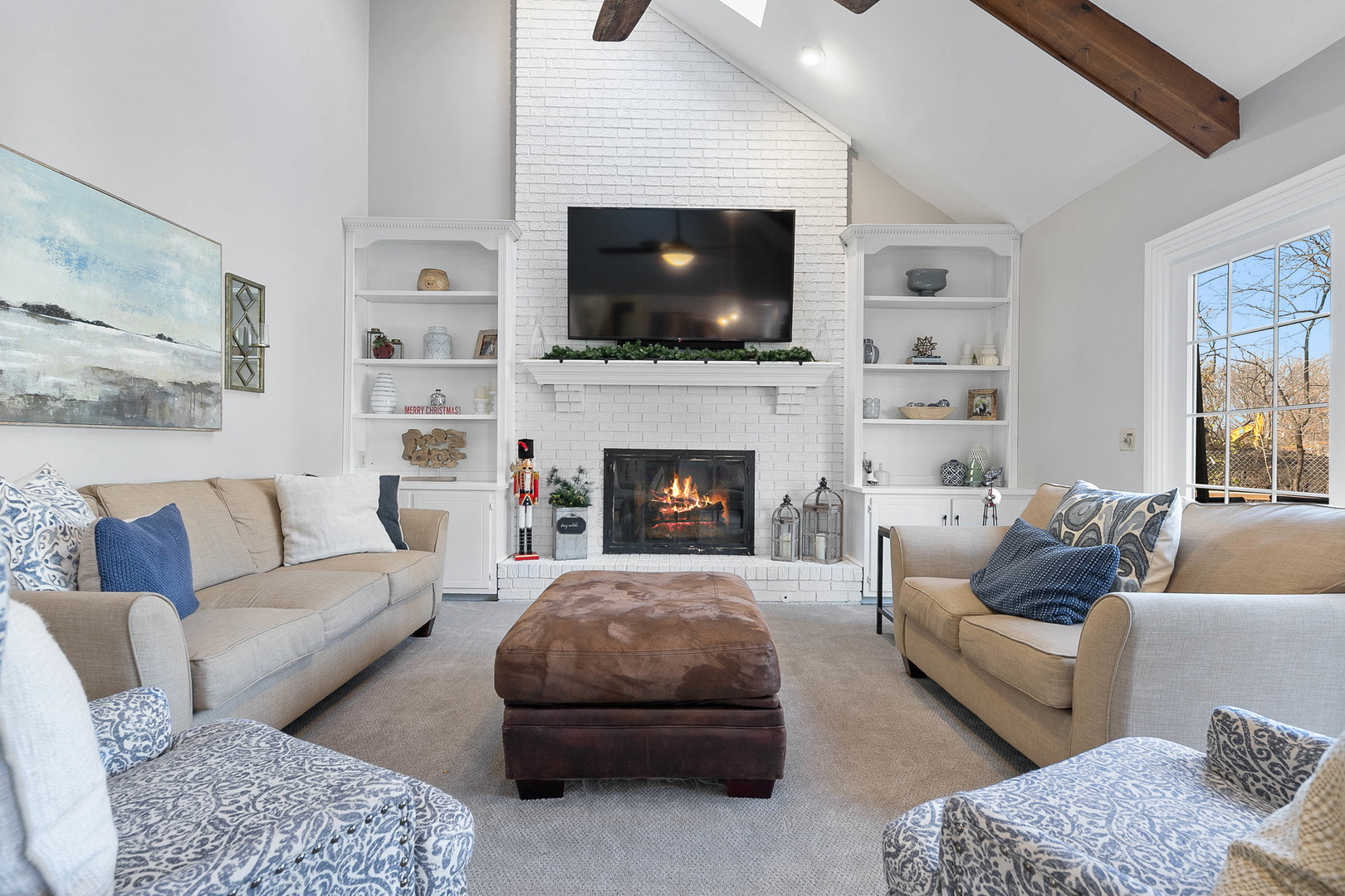 675 East Gartner Road Naperville, IL 60540 - Photo 14 of 31 a living room with furniture and a flat screen tv