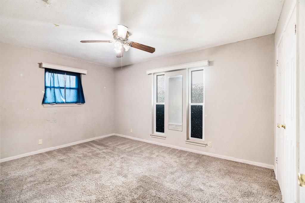 970 Mansfield Road Reno, TX 75462 - Photo 12 of 20 a view of an empty room with a window