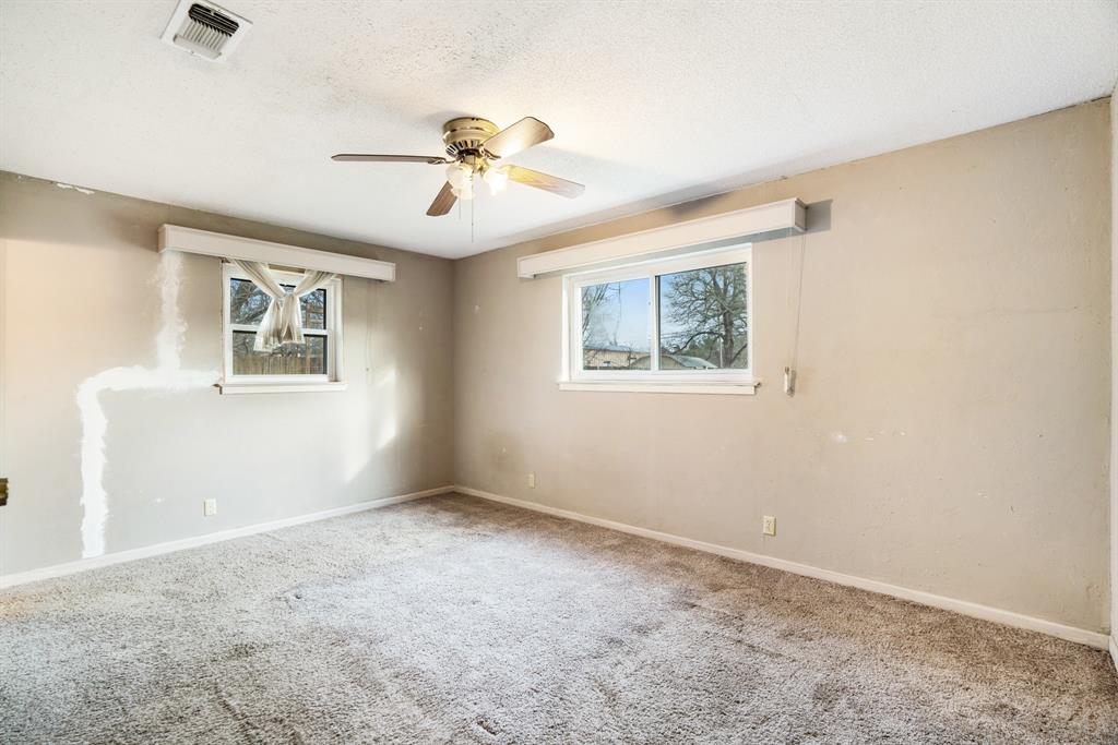 970 Mansfield Road Reno, TX 75462 - Photo 13 of 20 a view of an empty room with a window