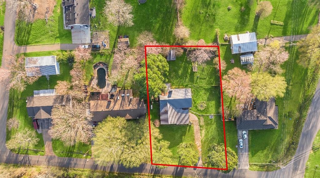 970 Mansfield Road Reno, TX 75462 - Photo 18 of 20 an aerial view of residential houses with outdoor space and street view