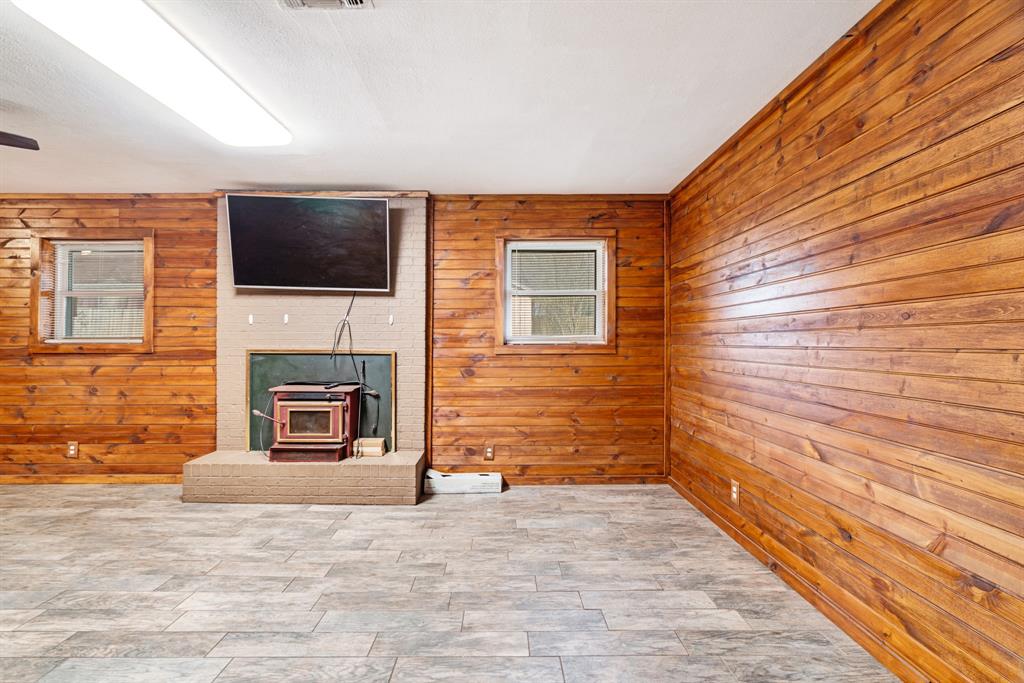 970 Mansfield Road Reno, TX 75462 - Photo 4 of 20 a view of a livingroom with a fireplace
