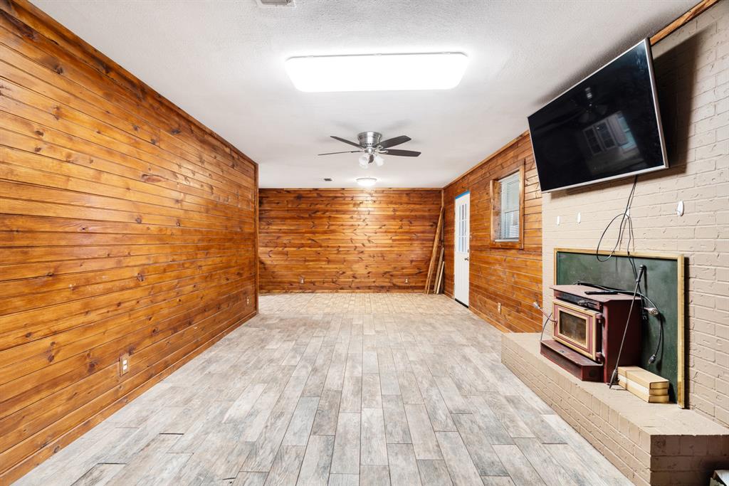 970 Mansfield Road Reno, TX 75462 - Photo 5 of 20 a view of a livingroom with a flat screen tv