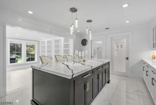 a kitchen with a sink and stove