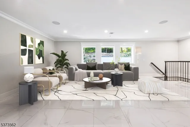 a bedroom with a large bed and a large window