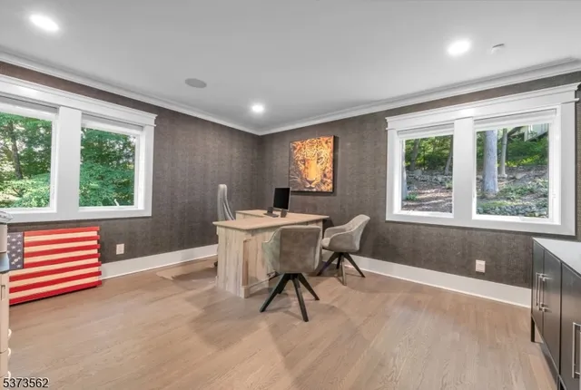 a bathroom with a sink mirror vanity and toilet
