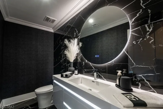 a spacious bedroom with a large bed and a large window