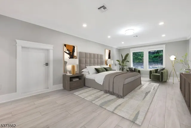 a bathroom with a granite countertop sink a shower and a mirror