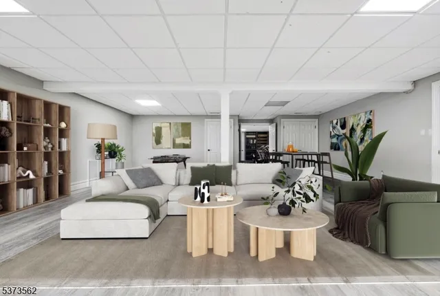 a room with gym equipment and a table