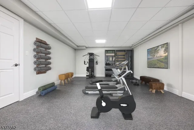 a front view of a house with a yard table and chairs