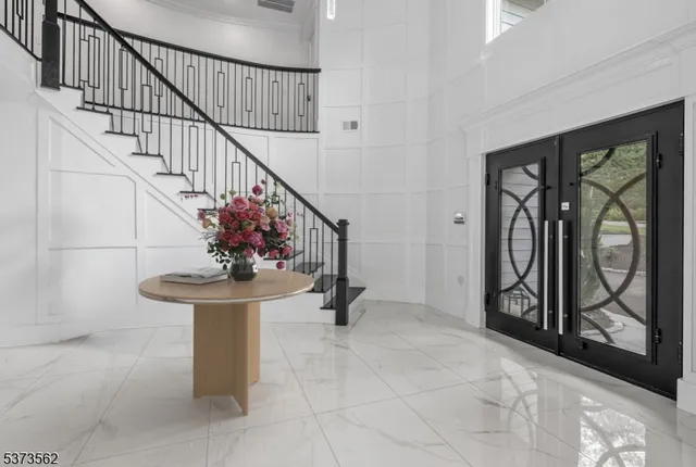 a view of entryway livingroom and hall