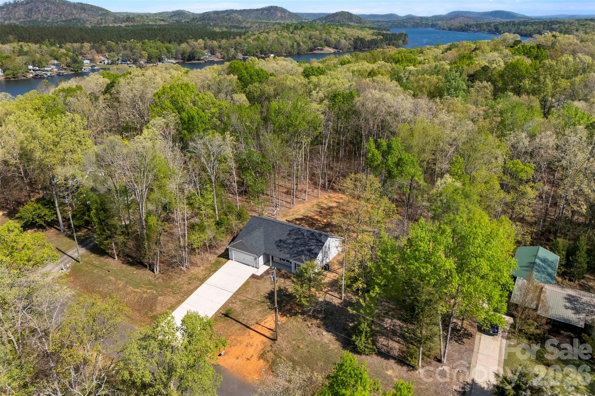 872 Roxboro Drive Mount Gilead, NC 27306 - Photo 32 of 41 a view of lake with mountain