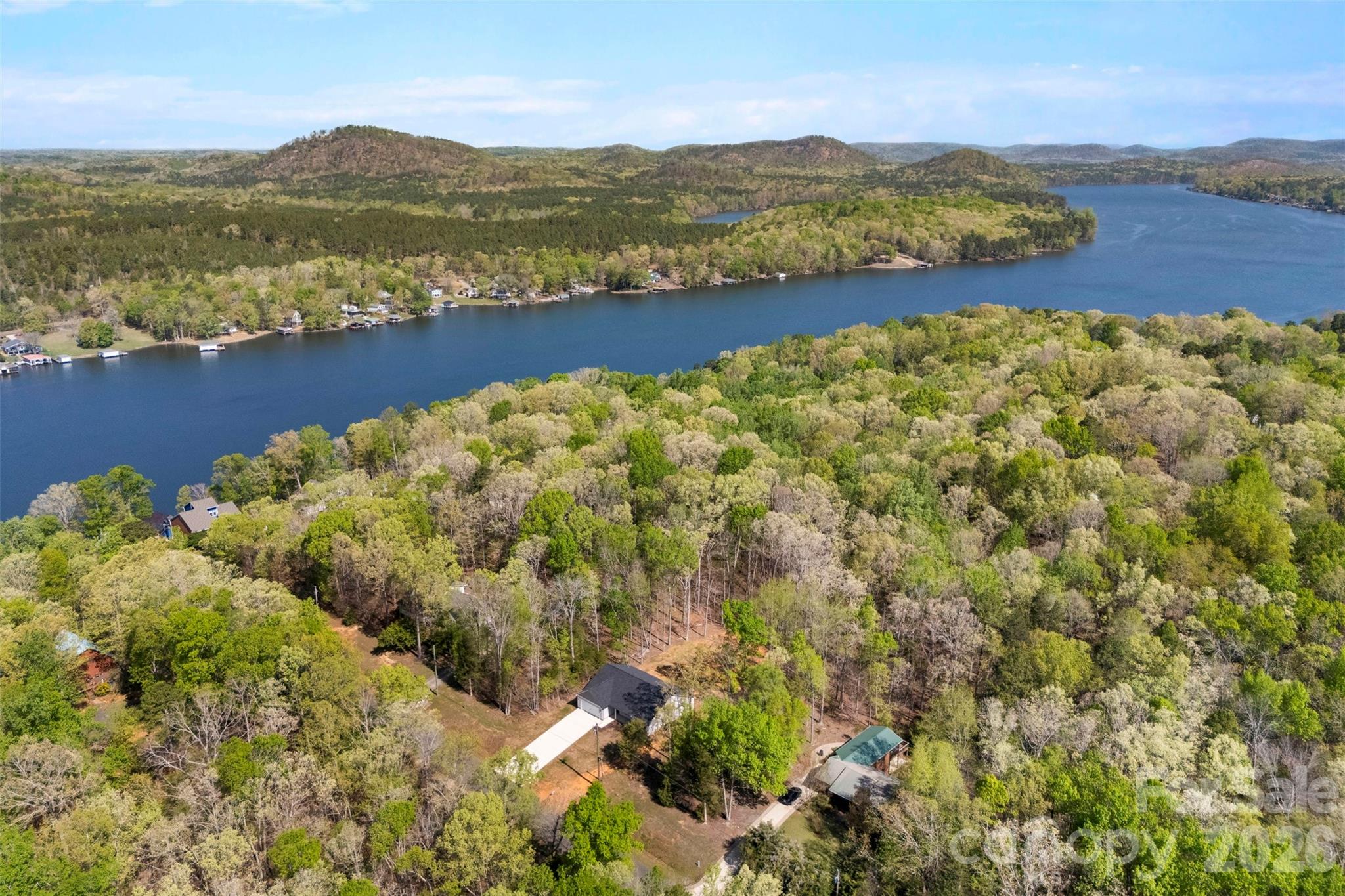 872 Roxboro Drive Mount Gilead, NC 27306 - Photo 33 of 41 a view of lake with mountain