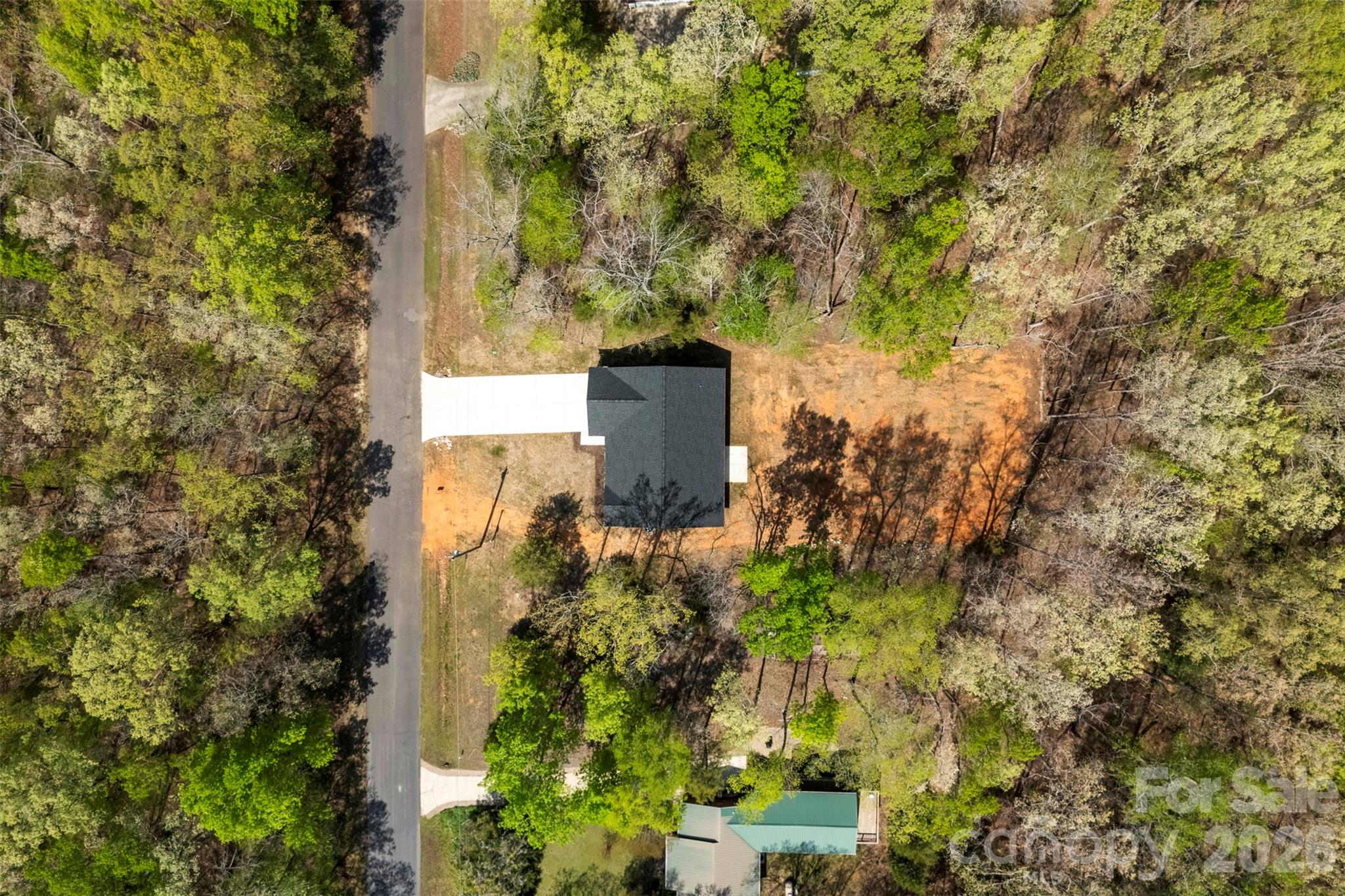 872 Roxboro Drive Mount Gilead, NC 27306 - Photo 35 of 41 an aerial view of a house with a yard