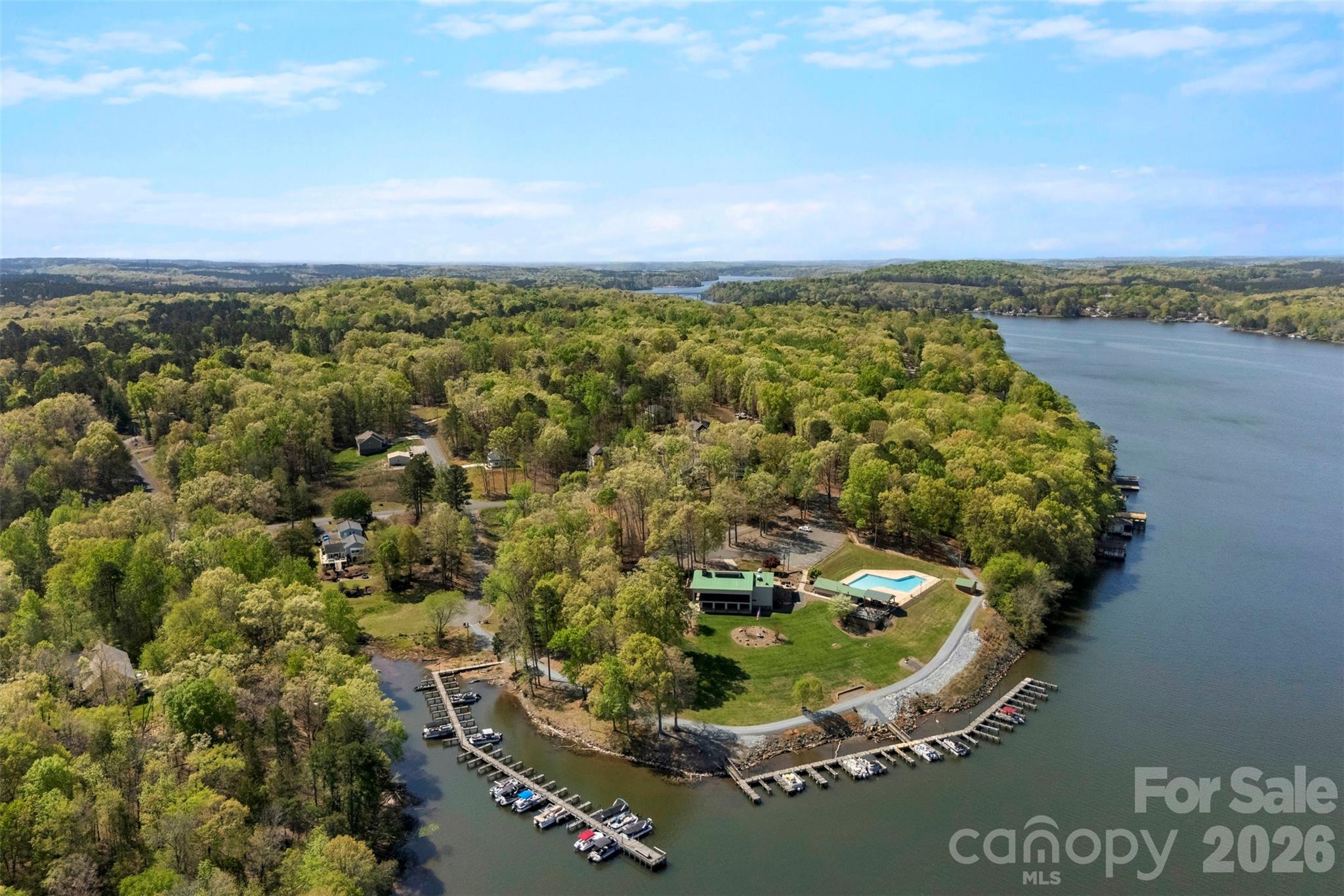 872 Roxboro Drive Mount Gilead, NC 27306 - Photo 38 of 41 a view of a lake with a yard
