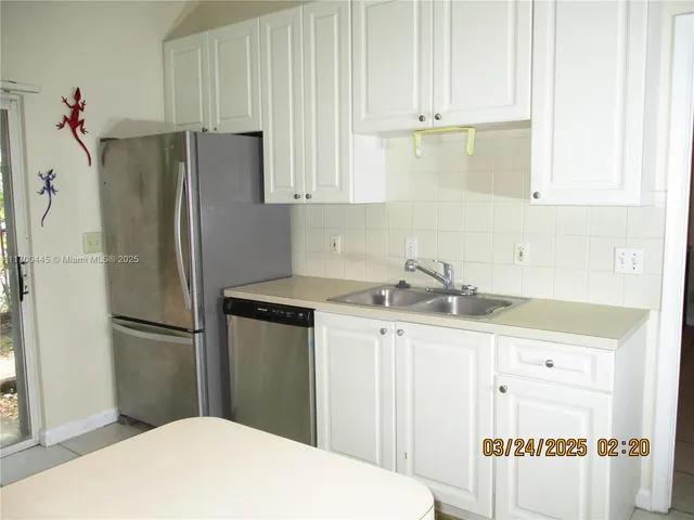 a utility room with washer and dryer