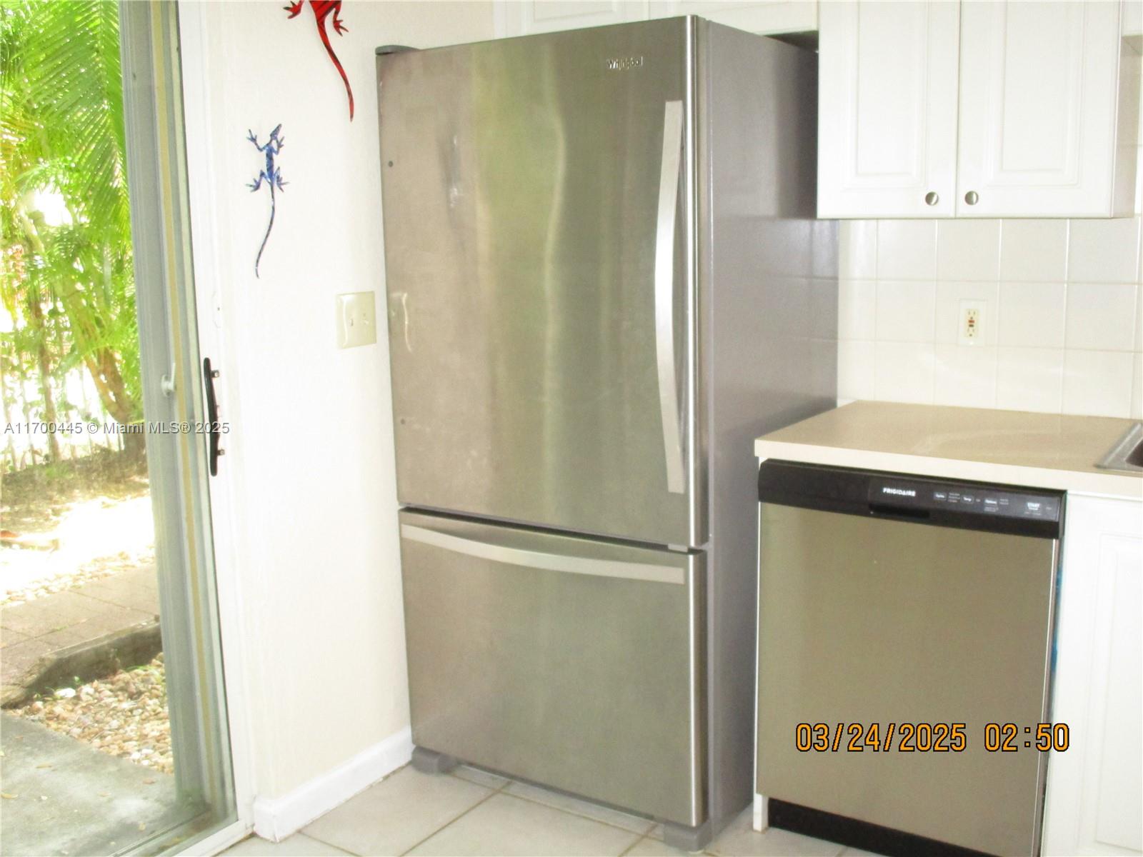 4802 Washington Street, Unit 2 Hollywood, FL 33021 - Photo 13 of 24 a utility room with washer and dryer